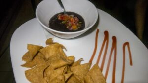 Complementary bean dip with chips, La Parrilla de Maria Bonita