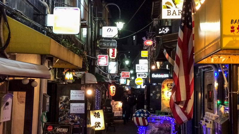 Neon lights lining a small alleyway of the Golden Gai