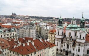 The rooftops of Prague with the Prague Castle in the background