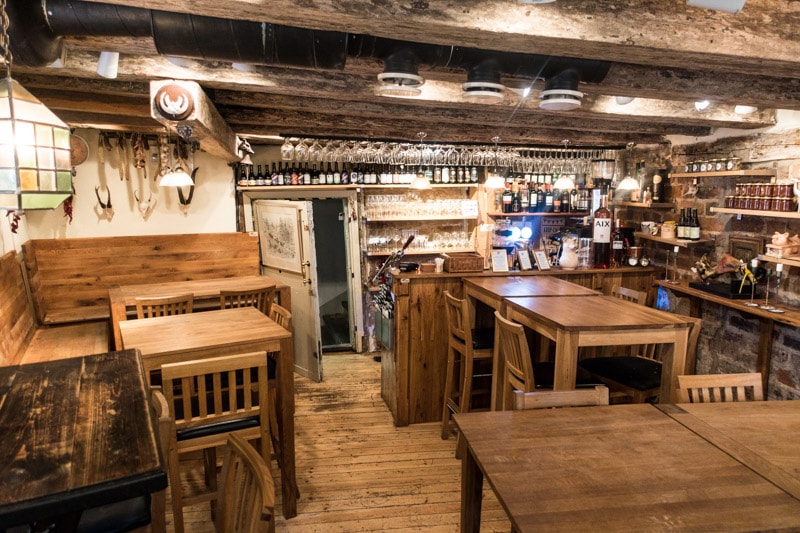 The tiny wooden interior of The Hairy Pig Deli
