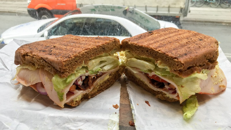 A massive turkey club sandwich from Smagsløget