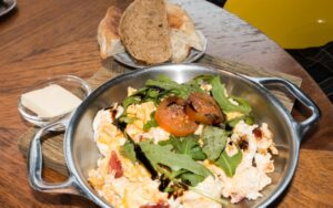 Cold Cuts: scrambled eggs with sucuk (spicy sausage) and a side of bread