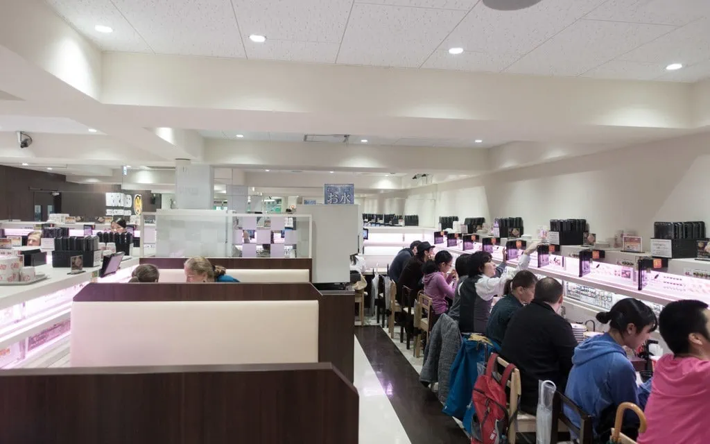A few small booths and more counter seating, Genki Sushi, Tokyo, Japan