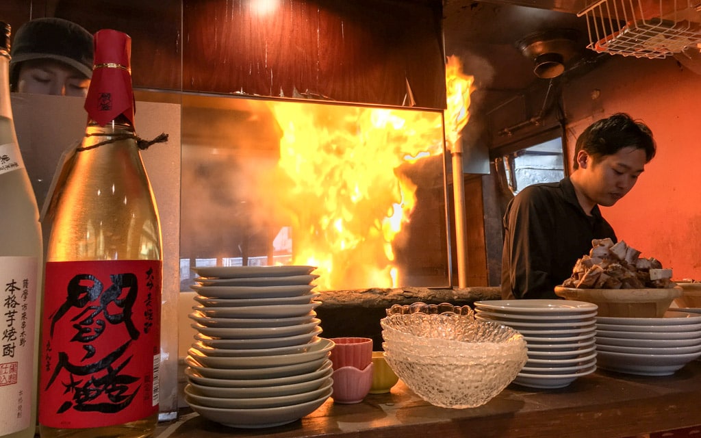 A ball of fire as the burnt ramen was being prepared by the chefs, Nishiazabu Gogyo, Tokyo, Japan