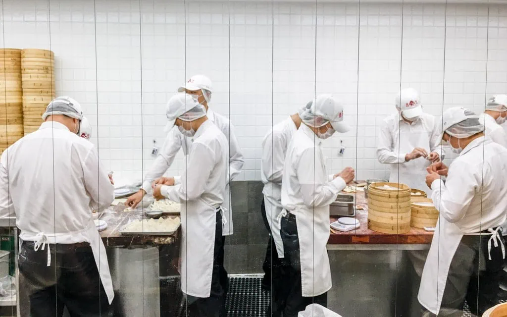 Busy workers making thousands of dumplings a day, Din Tai Fung, Taipei, Taiwan