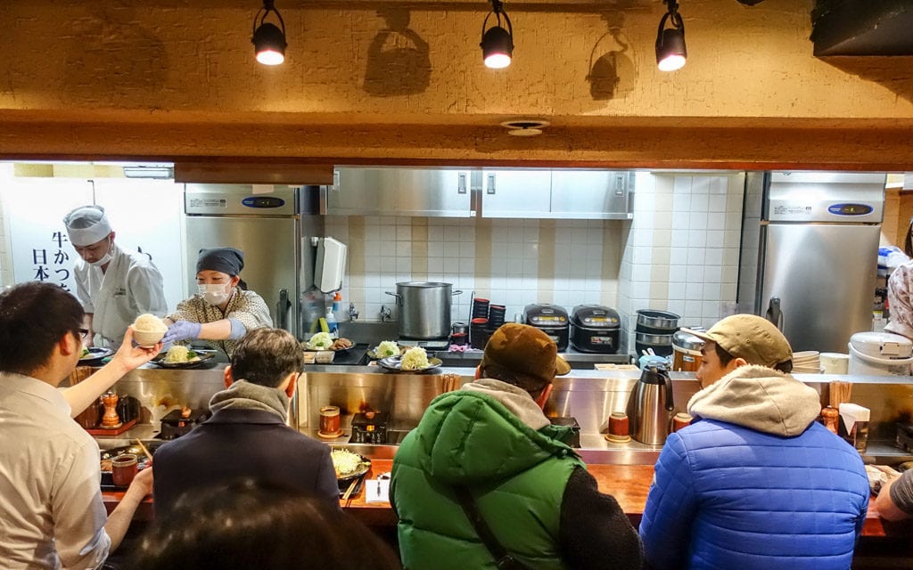 The small kitchen behind the counter, Gyukatsu Motomura Shinjuku Minamiguchi, Tokyo, Japan