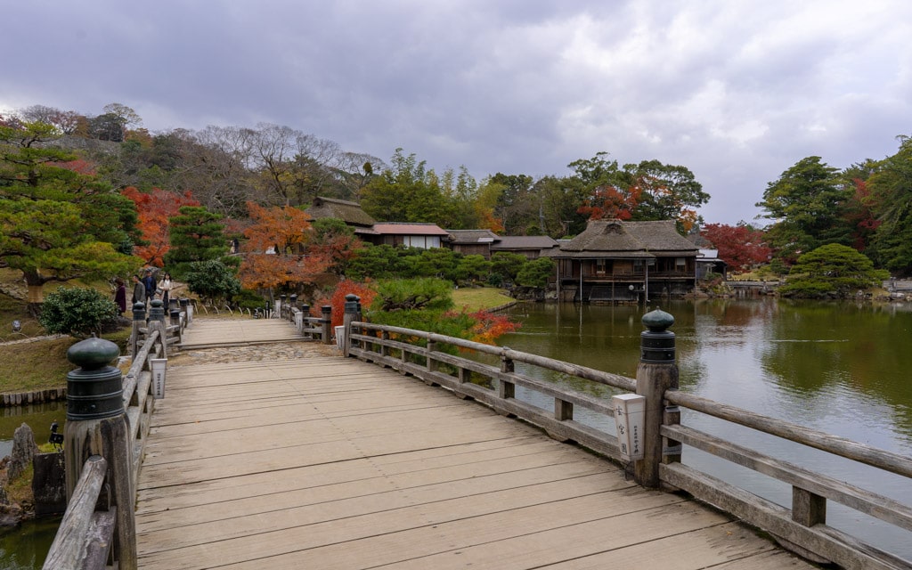 One of many bridges over the central pond, Genkyuen Garden