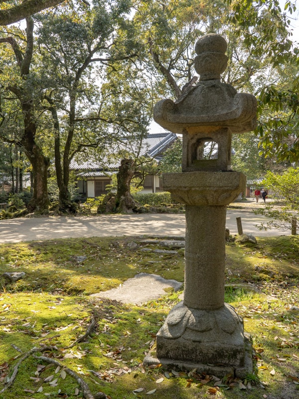 A stone lantern on the grounds of the temple, Kanzeonji Temple, Dazaifu, Fukuoka, Japan