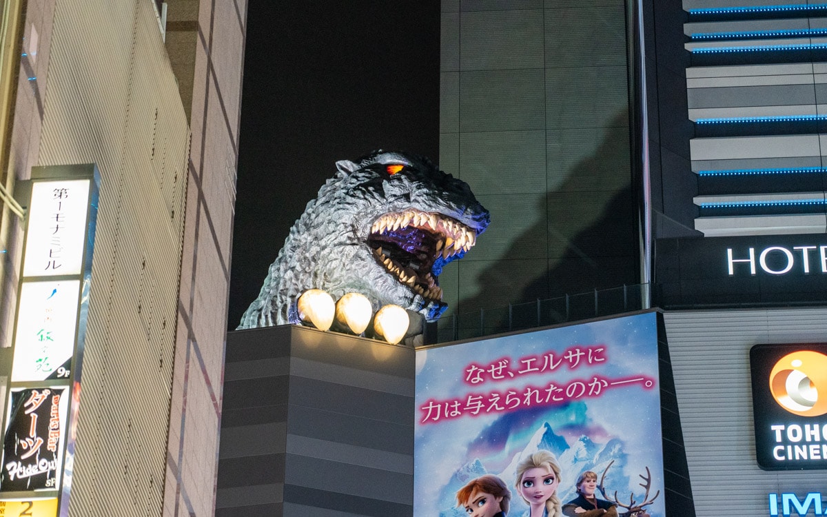 Godzilla Head perched high above the street