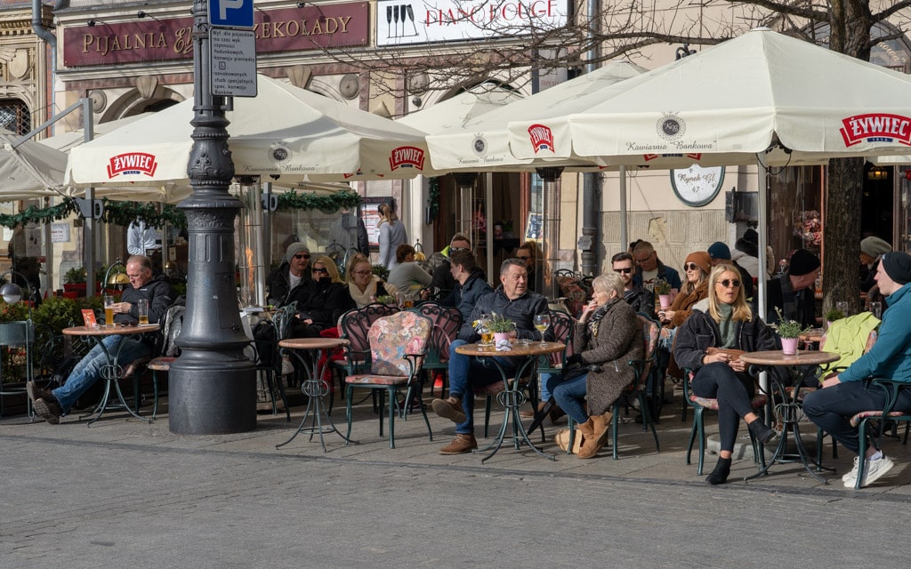 Enoying a drink on a square in Kraków