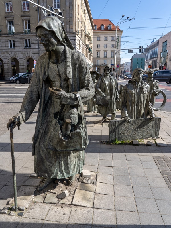 A woman rising up from the pavement