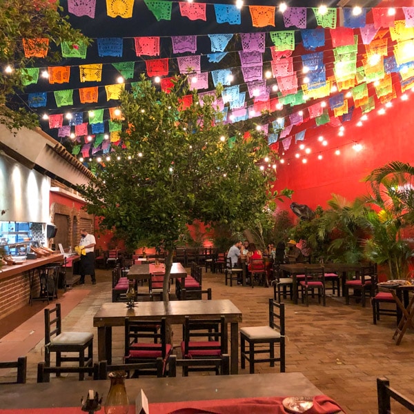 Open kitchen of the restaurant on the left