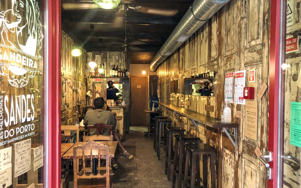 Narrow interior of the restaurant, A Sandeira do Porto, Portugal