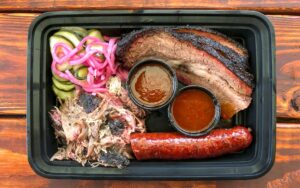 The colorful BBQ Plate of brisket, pulled pork, and sausage, Matt's BBQ, Portland, Oregon