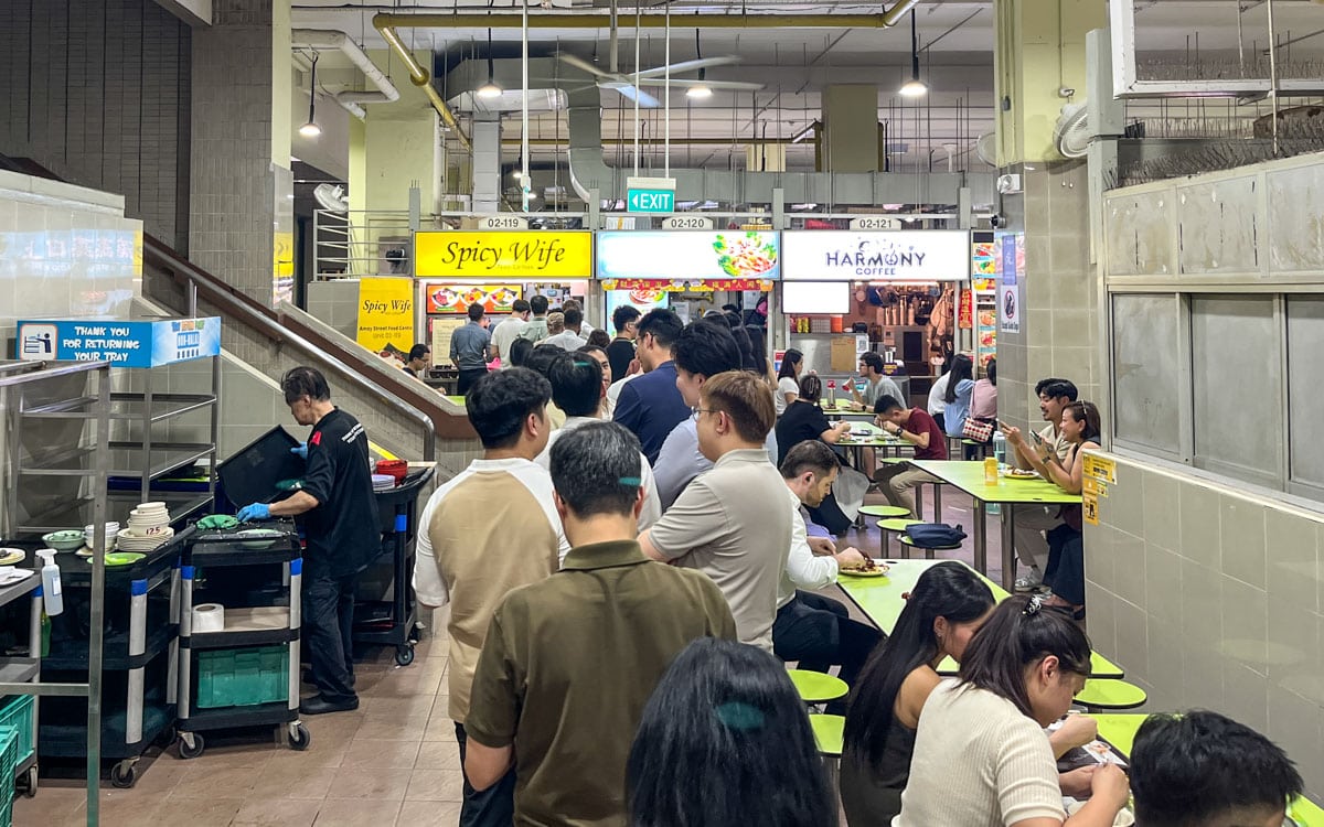 Long line of people in front of Spicy Wife Nasi Lemak at 12:45 PM